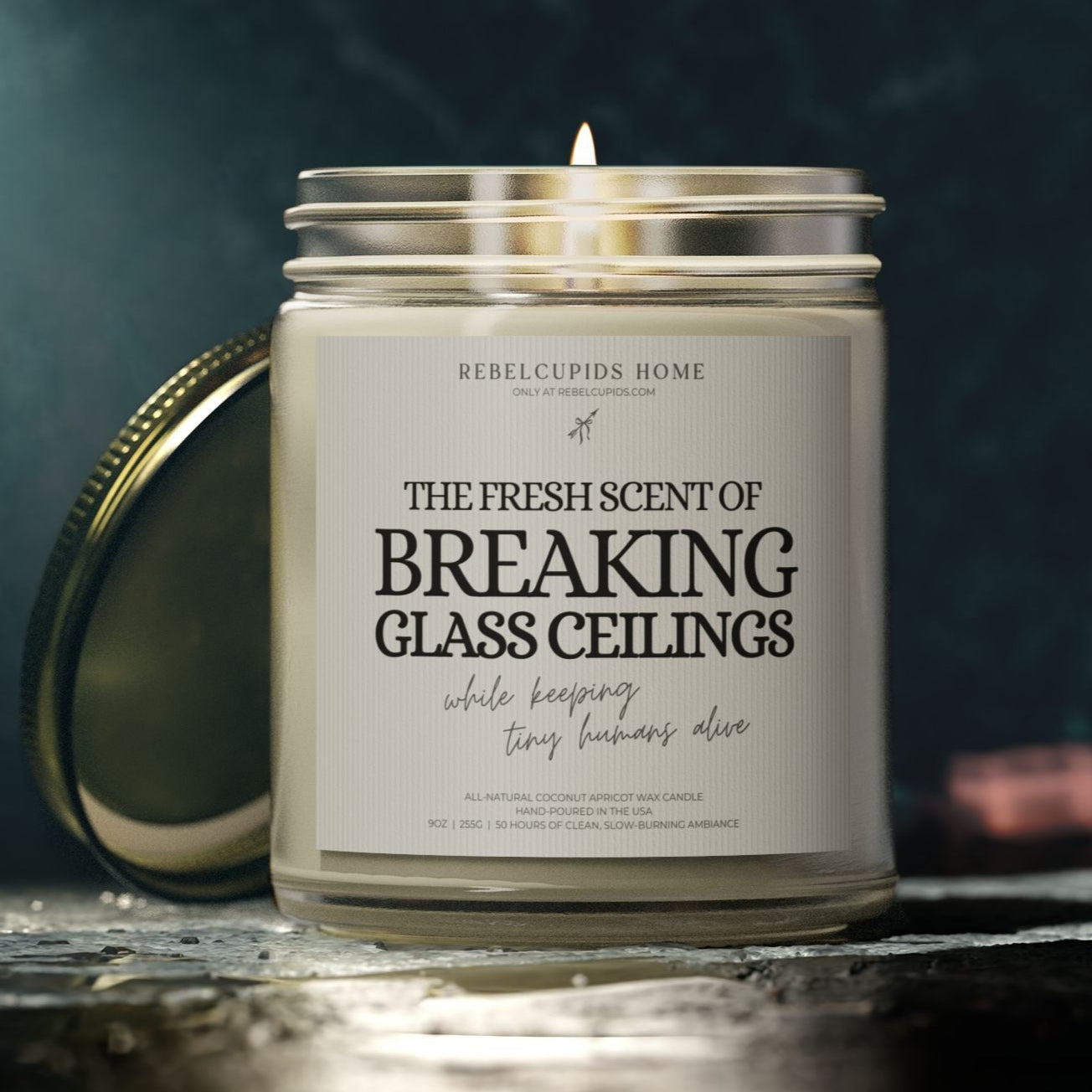 Candle with a label on a dark background
